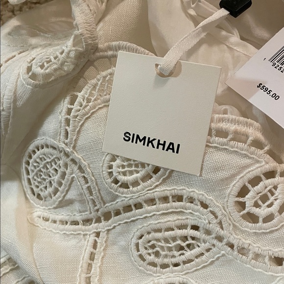 SIMKHAI Ivory Morrigan Short Sleeve Mini Dress. Models is wearing size 2. - Picture 7 of 8